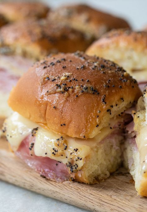 I can't say enough incredible thing about these savory and beyond delicious ham and cheese sliders on Hawaiian rolls! They are simple to make and perfect for parties! #Recipes #Ham #Cheese #Sliders #HandandCheeseSliders #Appetizers