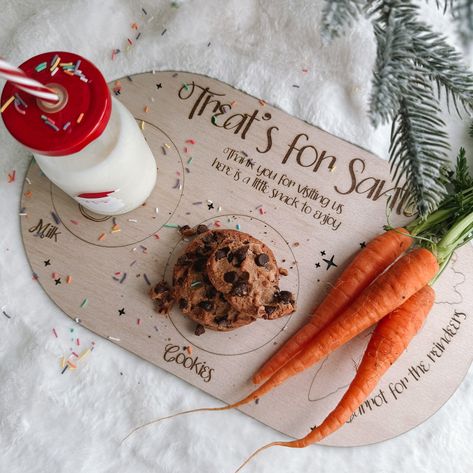 Get ready to make Santa’s visit even more special with our Santa’s Snack Station! Our adorable wooden treat board has dedicated spots for Santa’s milk and cookies and, of course, a carrot for the Rudolph! 🦌🎄 • • • • #christmasdecor2024 #santastreats #woodenkeepsakes #keepsakeornaments #christmasornaments Santa Aesthetic, Santa Cookies And Milk, Milk And Cookies For Santa, Treat Board, Snack Station, Cookies For Santa, Milk And Cookies, Santa Cookies, Milk N Cookies