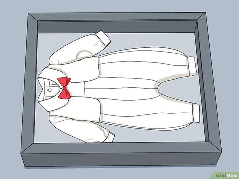 How to Frame Baby Clothes: 11 Steps (with Pictures) - wikiHow Framing Clothes, Framed Baby Clothes, Framed Wedding Dress In Closet, Baby Clothes Display, Box Frame Wedding Dress, Newborn Clothes Keepsake, Baby Clothes Blanket, T Shirt Frame, Picture Walls