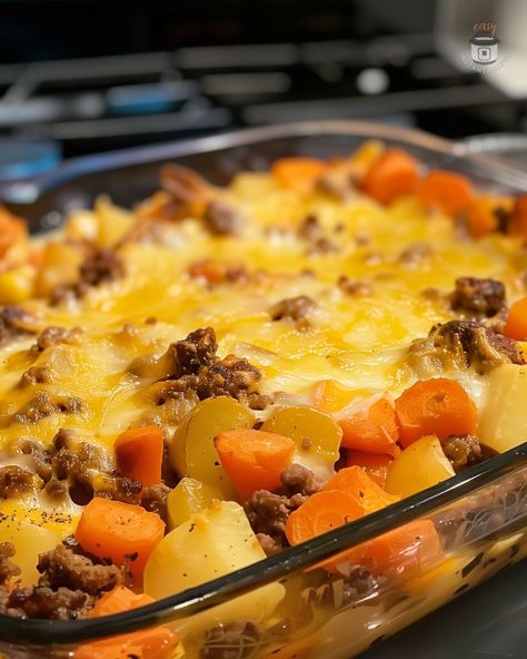 Discover the ultimate comfort meal with our Amish Hamburger with Fall Veggies Bake! 🍂🍖 This hearty, one-dish recipe combines seasoned ground beef with a vibrant mix of autumn vegetables like potatoes, carrots, and corn, all topped with melted cheddar cheese. Perfect for cozy family dinners or meal prepping for the week, this bake is easy to prepare and packed with flavor. Whether you're embracing Amish-inspired cooking or looking for a delicious fall recipe. Hamburger Carrots Potatoes Casserole, Amish Hamburger Bake, Hamburger And Mixed Vegetables, Hamburger Carrots And Potatoes, Hamburger And Vegetable Recipes, Hamburger Potato Carrot Casserole, Amish Hamburger With Fall Veggies Bake, Amish Country Casserole Ground Beef, Amish Hotdish