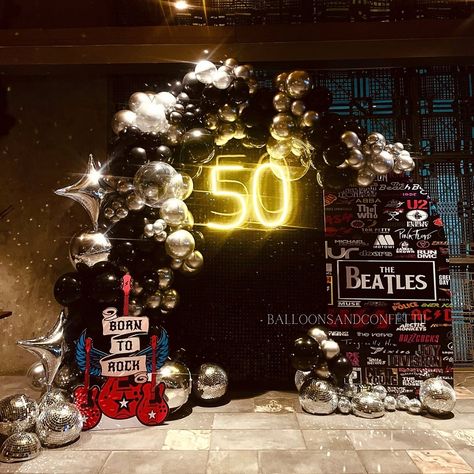 Rocked this party with some seriously cool decor! 🎸🔥 From guitar centerpieces to vinyl record accents, we brought the rockstar vibes and turned this party up to 11! Let's do it again! 🤘 . . . . . . . ( decor party, rock party, pop music, rock music, party balloon decor, music bands ) #decorparty #rockparty #rockmusic #popmusic #partyballoons #musicband #rockmusicband #balloonsandconfettii #balloonsdecor #partyvibes #disco Guitar Centerpieces, Rock Theme Party, Guitar Party, Rock Star Theme, Music Themed Parties, Rock Star Party, Hard Rock Music, Cool Decor, Party Rock