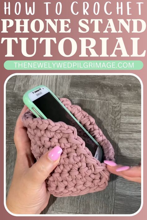 How To Crochet Vertical Phone Holder (Step-by-Step Tutorial) - The Newlywed Crochet Phone Stand, Grandma Era, Cell Phone Charger Holder, Crochet T Shirts, Basic Crochet, Watching Videos, Free Tshirt, Basic Crochet Stitches, Yarn Projects