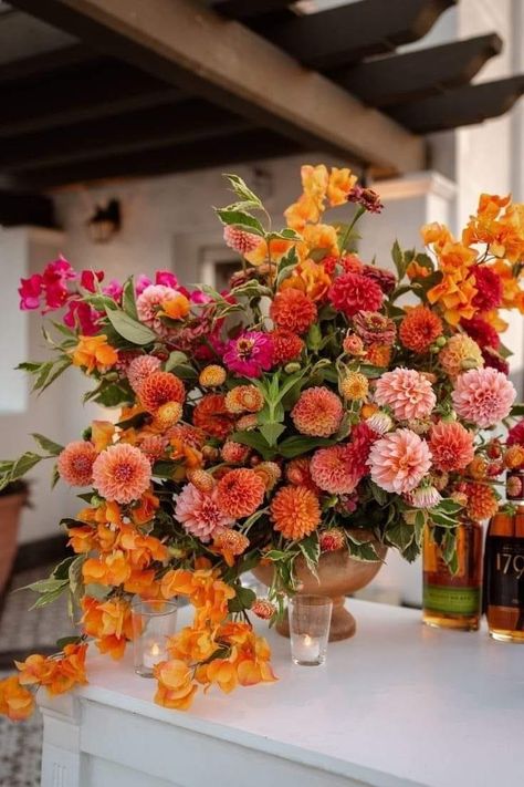 Fiesta Wedding Flowers, Wedding Centerpieces For Circle Tables, Orange Flower Decorations, Spanish Floral Arrangements, Orange Orchid Bouquet, Red Spring Flowers, Cube Floral Arrangements, Strawflower Arrangement, Fall Floral Design