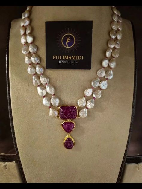 Shop this at #Repost @pulimamidijewellers —— pulimamidijewellers #carvingstonejewelry #22caratgoldjewellery #pulimamidijewellers #trendingjewellery #poshcarat | PoshCarat | Afro Sound Machine · Ijoya Jwellery Idea With Saree, Beautiful Necklaces Unique, Antique Pearl Jewelry, Pearl Jewelry Design Simple, Gold Necklace Set New Design 2023, Pearl Jwellary, Modern Pearl Necklace Design, Jewelry Graphic Design, Beads Jewelry Indian Gold