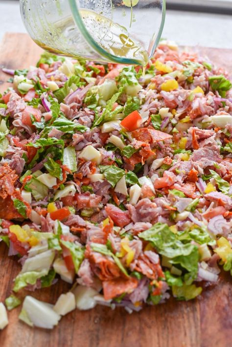 chopped sandwich recipe (1) Grinder Chopped Sandwich, Italian Chopped Sub, Sub Sandwich Salad, Chopped Sandwich Recipe, Lunch Meat Wraps, Italian Sandwich Recipe, Chopped Italian Sandwich, Chopped Sandwich, Italian Sandwich Recipes