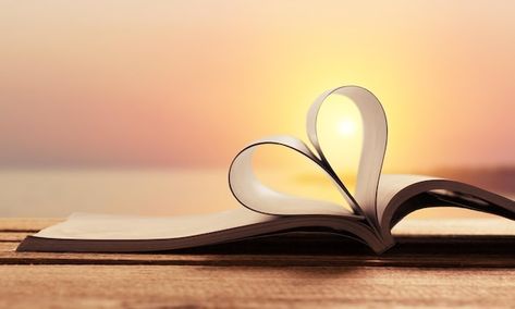 Heart from a book on sunset background | Premium Photo #Freepik #photo #love-book #open-book #wisdom #old-book Background Pictures For Facebook, Background Facebook Cover, Facebook Background, Jesus Background, Library Posters, Wallpaper Bible, Cover Pics For Facebook, Orange Book