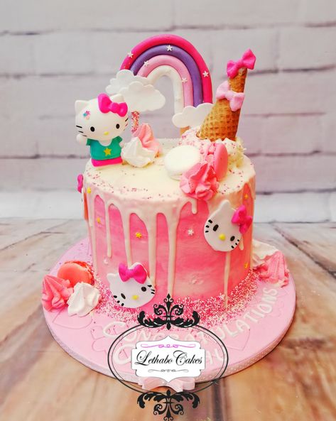 Hello kitty drip cake for kiddies Hallo Kitty Cake Birthdays, Hello Kitty Drip Cake, Hello Kitty And Friends Birthday Cake, Hello Kitty 6th Birthday, Hello Kitty Birthday Cake Ideas, Simple Hello Kitty Cake Design, Hello Kity Cakes, Hello Kitty 5th Birthday, Hello Kitty Birthday Party Ideas Cake