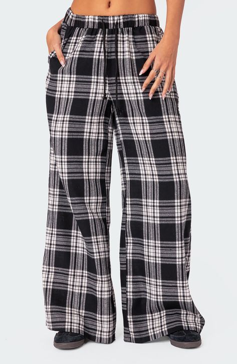 Lounging at home has never looked as good as it does in classic plaid pants cut in a breezy wide-leg silhouette with a comfortable drawstring waistband. Elastic/drawstring waist Front slant pockets 50% cotton, 50% polyester Machine wash, line dry Imported Pajama Pants Outfit, Plaid Wide Leg Pants, Black Pajama Pants, Pj Outfit, White Pajamas, Cute Pjs, Plaid Pajama Pants, Cute Pants, Plaid Pajamas