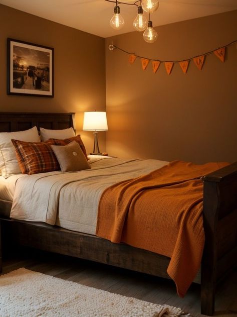 Create a warm and inviting rustic orange accent wall in your bedroom, and complement it with a dark wood bedframe and a cozy plaid throw blanket. Complete the look with vintage Edison bulb string lights for a charming touch. Dark Wood Bedframe, Orange Accent Wall, Orange Accent Walls, Dark Wood Bedroom, Edison Bulb String Lights, Rustic Orange, Plaid Throw Blanket, Bulb String Lights, Vintage Edison Bulbs