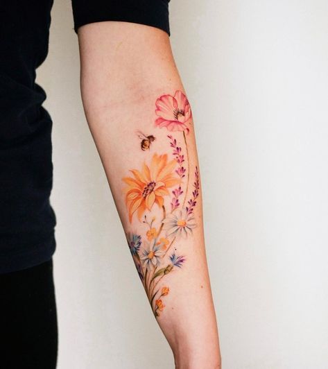 Bee And Wildflower Tattoo, Watercolor Tattoo For Women Unique, Wildflowers Tattoo Color, Bees And Wildflowers Tattoo, Bug And Flower Tattoo, Wildflower Tattoo Forearm Color, Small Wildflower Tattoo Color, Wildflowers And Wild Horses Tattoo, Vintage Floral Tattoos