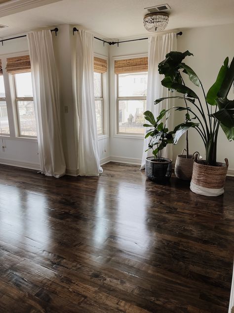 Adding Hardwood Floors in Primary Bedroom - Life Love Larson Dark Wood Floors Modern, White Walls Dark Hardwood Floors, White Furniture Dark Floors, Apartment Wood Floors, Pecan Wood Floors Living Room, Farmhouse Dark Floors, Bedrooms With Wooden Floors, Boho Living Room Dark Floors, Dark Real Wood Floors