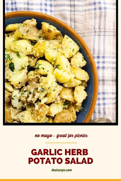 Looking for something new for your summer cookout? Say goodbye to traditional potato salad and try our Herb Garlic Potato Salad. It's packed with fresh herbs, garlic, and a tangy dressing that will have your guests coming back for seconds. picnic recipes | cookout recipes | summer side dishes