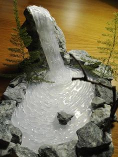 Hot Glue Waterfall, Crafts With Hot Glue, Diy Waterfall, Hot Glue Art, Glue Art, Diy Christmas Village, Fairy Garden Crafts, Christmas Village Display, Village Display