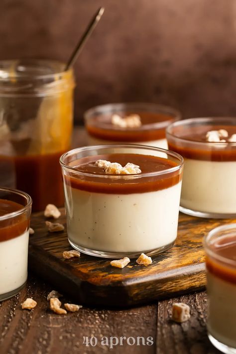 This restaurant -quality creamy panna cotta is spiked with real vanilla bean seeds, all layered with a sinfully rich homemade caramel sauce. 40 Aprons, Homemade Fried Chicken, Panna Cotta Recipe, Homemade Caramel Sauce, Creamy Desserts, Baked Fish, Homemade Caramel, Eat Dessert First, Caramel Sauce