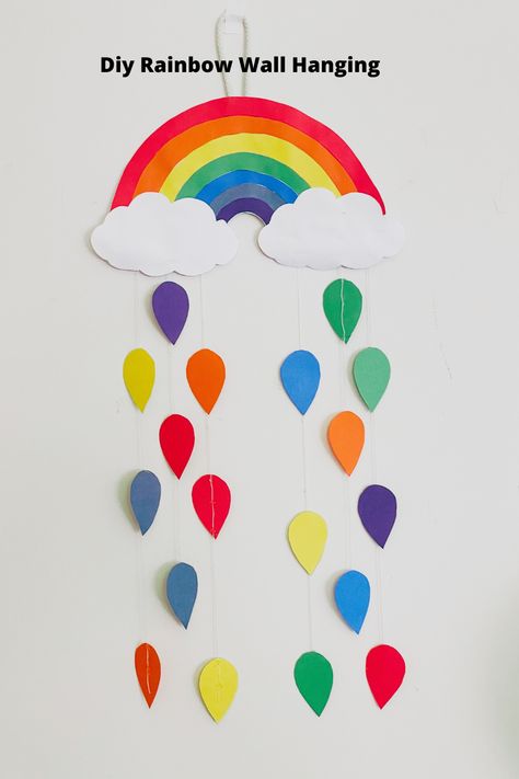 Rainbow Hanging Crafts, Construction Paper Rainbow, Wall Hanging Craft Ideas With Paper For School, How To Make Rainbow, Thread Art On Paper, Rainbow Paper Craft, Rainbow Hanging Decor, Rainbow Wall Hanging Diy, Diy Rainbow Wall