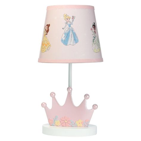 This officially licensed Disney Princesses "grow with me" lamp will add a soft glow to your little girl's room. The lamp features a custom molded resin crown in a soft pink color. It is accented with a raised floral garland hand painted in pink, yellow and green flowers in a pearlized finish. The lamp shade is 6" in height and has all three Disney Princesses (Belle, Tiana, and Cinderella) dressed in their favorite ballgowns. An energy efficient CFL 13W light bulb is included. Disney Princess Nursery Theme, Disney Princess Lamp, Princess Nursery Theme, Resin Crown, Princess Lamp, Disney Princess Bedroom, Disney Princess Nursery, Disney Princess Room, Yellow And Green Flowers