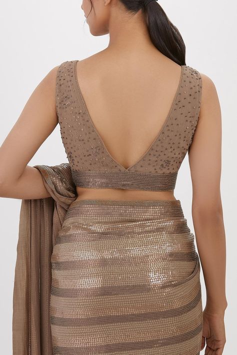 Buy Nakul Sen Grey Chiffon Stripe Pattern Saree With Sleeveless Blouse Online | Aza Fashions Blouse Designs For Sequin Saree, Lehriya Blouse Designs Latest, V Neck Blouse Jewellery Ideas, V Neck Sleeveless Saree Blouse, Stylish Blouse Design Unique Back 2024, Back V Neck Blouse Design, Sleeveless Blouse Designs For Silk Saree, Sleeve Less Blouse Designs, Sleeveless Blouse Designs Saree