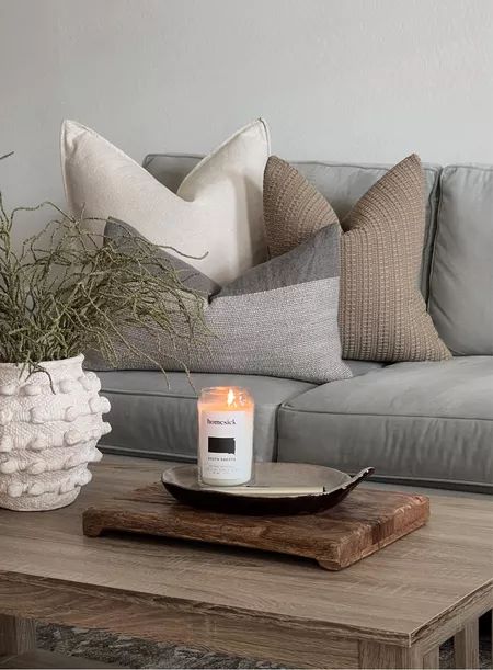 Shop "pillows for gray couch" on LTK Grey Couches Pillow Ideas, Grey Pillows Couch, Cream Pillows On Gray Couch, Gray Couch Neutral Pillows, Grey Couch Tan Pillows, Grey Couch Leather Ottoman, Light Grey Couch Styling Modern, Neutral Pillows For Gray Couch, Couch Pillow Arrangement Sectional Gray