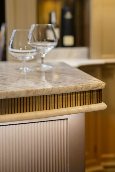 Detail from a home bar with double layered marble & bronze worktop and fluted painted panel below by Hetherington Newman. Marble Bar Top, Marble Detail, Marble Bar, Joinery Details, House Restoration, Luxury Bar, Counter Design, Cabinetry Design, Pool Bar