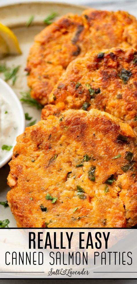 a plate with three salmon cakes and text overlay that reads really easy canned salmon patties Healthy Salmon Dinner Recipes, Dinner Recipes Fish, Baked Seafood, Canned Salmon Patties, Healthy Salmon Dinner, Salmon Dinner Recipes, Salmon Burger Recipe, Canned Salmon Recipes, Salmon Cakes Recipe