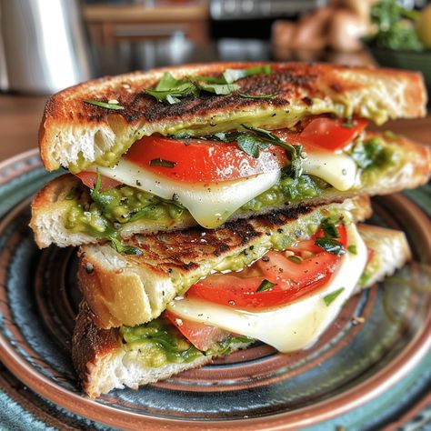 Savor the flavors of an Avocado, Mozzarella, and Tomato Grilled Cheese. Perfectly crispy and deliciously cheesy in every bite. Tomato And Avocado Sandwich, Avocado Cheese Sandwich, Pesto Tomato Mozzarella Sandwich, Tomato And Mozzarella Sandwich, Grilled Mozzarella Sandwiches, Grilled Cheese With Avocado, Tomato Mozzarella Sandwich, Mozzarella Grilled Cheese, Tomato Grilled Cheese