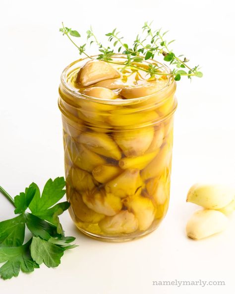 Make this EASY Garlic Confit recipe and transform your everyday recipes with the delicious, subtle taste of garlic oil! If you want to know how to make garlic oil, and how to use garlic that's been slowly roasted in garlic, this is the recipe for you! #namelymarly #garlic #garlicconfit #confit #garlicoil Aperitivo Party, Confit Garlic, Brine Recipes, Confit Recipes, Garlic Confit, Garlic Infused Olive Oil, Garlic Recipe, Canning Recipe, Garlic Oil