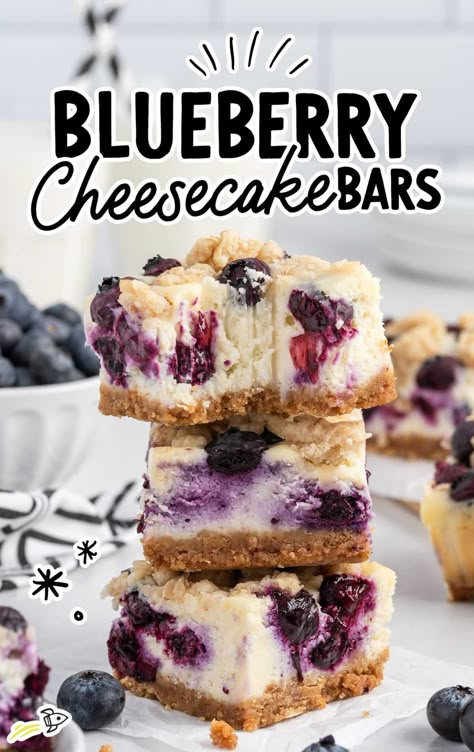 a close up shot of Blueberry Cheesecake Bars stacked on top of each other with one having a bite taken off Blueberry Cheesecake Bites, Bluberry Muffins, Blueberry Crumb Bars, Holiday Deserts, Vanilla Wafer Crust, Blueberry Cheesecake Bars, Cheesecake Bar, Blueberry Bars, Bakers Delight