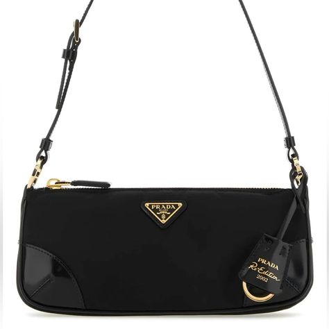 Prada Re-Edition 2002 Mini Shoulder Bag Is Made Of Prada's Innovative Re-Nylon Fabric And Adorned With Brushed Leather. - Enameled Metal Triangle Logo. - Zipper Closure. - Adjustable Shoulder Strap. - Measurements: 23.5 W / 9.2'' W X 10.0 H / 3.9'' H X 5.0 L / 1.9'' L Adjustable Leather Handle. Max. Drop Length: 23 Cm / 9'' - Min. Drop Length: 20 Cm / 7.8'' - Made In Italy. - Designer Sku Number: 1bc201r789 - Designer Color: F0002 Prada Reedition 2000, Vintage Prada Bag, Prada Nylon Bag, Vintage Designer Handbags, Nyc Winter, Prada Purses, Bags Prada, Fashion Girly, Prada Re Edition