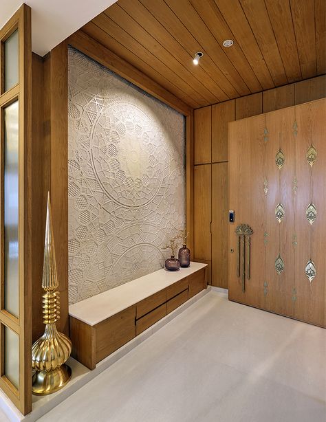 Surabhi Kankaria Shah and Arpit Jain present a craft-effused home in Vadodara - ELLE DECOR Pintu Interior, Apartment Entrance, Temple Design For Home, Plafond Design, Pooja Room Design, Flat Interior, Foyer Design, New Interior Design, Lobby Design