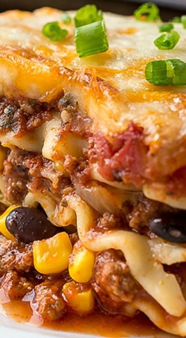 Mexican Lasagna with Fire-Roasted Tomato Sauce Southwestern Dishes, Mexican Lasagna Recipes, Mexican Lasagna, Roasted Tomato Sauce, Tuna Casserole, Roasted Tomato, Fire Roasted Tomatoes, No Noodle Lasagna, Fire Roasted