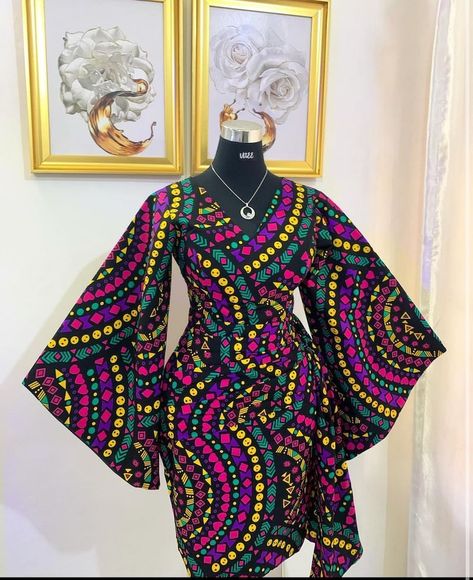 30 Stylish Ankara Styles You Need to Try Right Now Classy Gowns Elegant, Ankara Flare Dress Styles, Decent Dresses, Wax Dress, Chitenge Outfits, Simple Dress Styles, Ankara Dress Designs, Ankara Short Gown Styles, Ankara Dress Styles