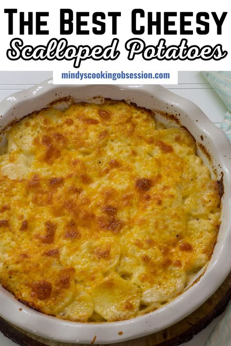 Sliced potatoes are layered with a creamy cheese sauce, topped with more cheddar cheese then baked until the potatoes are tender and the cheese is golden brown. Made with Russet potatoes, onion, butter, milk, flour, salt and pepper, it's the perfect side dish for Sunday dinner or holiday dinner. via @mindyscookingobsession Slow Cooker Russet Potatoes, Cheese Scalloped Potatoes Easy, Scalloped Potatoes With Milk, Russet Potato Recipes Side Dishes, Cheesy Scalloped Potatoes Easy, Russet Potato Side Dishes, Best Cheesy Scalloped Potatoes, Easy Cheesy Scalloped Potatoes Recipe, Easy Cheesy Scalloped Potatoes