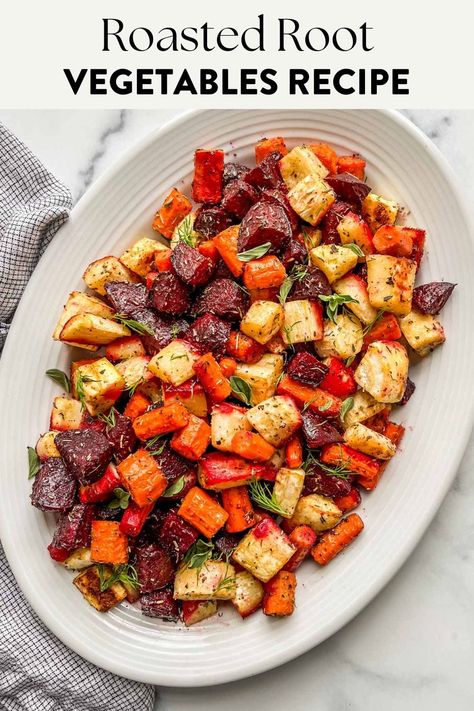 Oven roasted root vegetables on a large serving platter. Oven Roasted Root Vegetables, Roasted Fall Vegetables, Root Vegetables Recipes, Roasted Veggies In Oven, Colorful Carrots, Roasted Root Veggies, Thanksgiving Vegetables, Healthy Side Dish, Roasted Vegetable Recipes