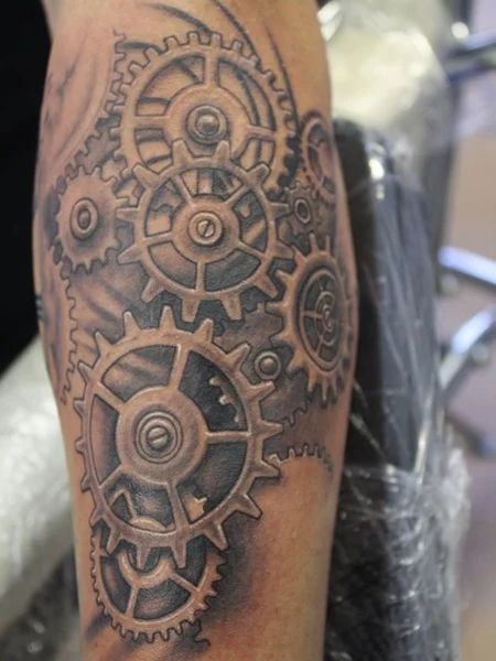 20 Best Clock Tattoos for Men in 2022 - The Trend Spotter Watch Gears Tattoo, Clockwork Tattoo, Biomech Tattoo, Gear Tattoo, Tattoos Pinterest, Mechanic Tattoo, Tattoos With Kids Names, Biomechanical Tattoo, Men Tattoos