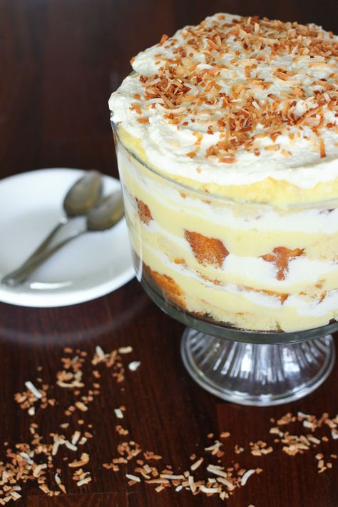 This Easy Coconut Cream Trifle is so much easier than pie, and at LEAST as delicious. You can make all the parts ahead of time and assemble it at the last minute! Coconut Cream Trifle, Coconut Trifle, Trifle Bowl Recipes, Cheap Desserts, Trifle Dessert Recipes, Hp Sauce, Coconut Pudding, Coconut Desserts, Trifle Desserts