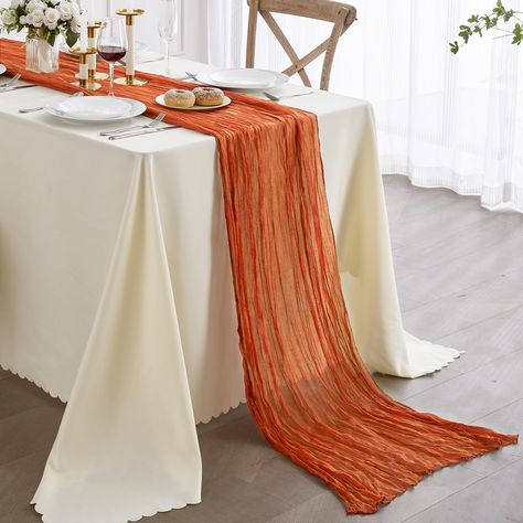 PRICES MAY VARY. 35*160inch Reusable Table Runner, No Color Loss & Shrinkage. PERFECT DECORATION - Our boho table runner made of 100% High quality gauze,the fabric is very soft,exquisite sewing and not easy to loose thread. The gauze table runner has Beautiful folds,rustic and beautiful,drapes gracefully across your table and let it flow loosely on the floor. Give your guests a great dining experience! SUITABLE SIZE - The cheesecloth table runner size is 35 x 160 Inch,light weight and easy to st Spanish Table Decor, Tablecloth With Runner, Boho Wedding Table Runner, Woodstock Party, Cheese Cloth Table Runner, Orange Table Runner, Boho Wedding Party, Orange Wedding Decorations, Pumpkin Painting Party