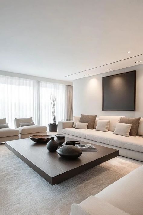 "Elevate your space with the charm of a Modern Minimalist Living Room! 🛋️🌿 Perfect for creating a calm and stylish atmosphere. 🌟✨ #MinimalistStyle #LivingRoomIdeas #ModernDecorInspo" Livingrooms Design Ideas Minimalist, White Minimalist House Interiors, Minimal Couches Living Room, Modern Minimalist Interior Design Living Room Apartment, Modern House Decor Living Room, Neutral Living Room Modern, Minimal Home Aesthetic, White Wall Living Room, Modern Living Room Grey