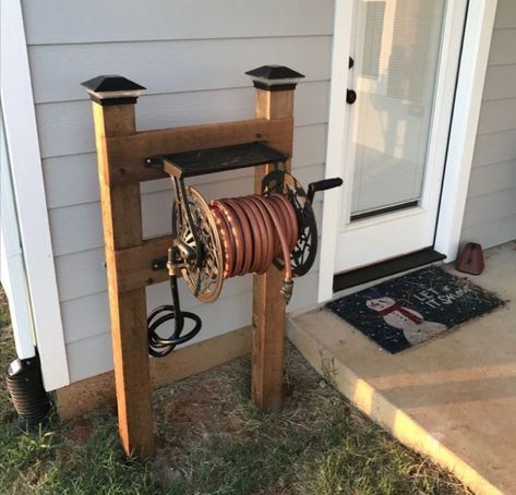 Spring Backyard, Garden Hose Storage, Garden Hose Holder, Hose Storage, Hose Holder, Front Porch Ideas Curb Appeal, Small Front Porches, Hose Reel, Front Porch Ideas