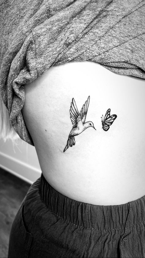 Hummingbird Rib Tattoo, Hummingbird And Butterfly Tattoo, Butterfly Rib Tattoo, Bird Tattoo Ribs, Small Hummingbird Tattoo, Small Rib Tattoos, Bow Tattoo Designs, Rib Tattoos For Women, Traditional Tattoo Inspiration