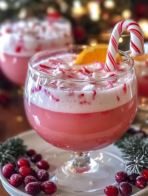 Candy Cane Christmas Punch Spiked Punch Bowl Recipes, Candy Cane Shooters, Candy Cane Punch Recipe, Candy Cane Alcoholic Drink, Santa’s Hat Shirley Temple Mocktail, Christmas Punch Bowl Recipes Alcholic, Christmas Batched Cocktails, Specialty Christmas Cocktails, Candy Cane Rimmed Drink