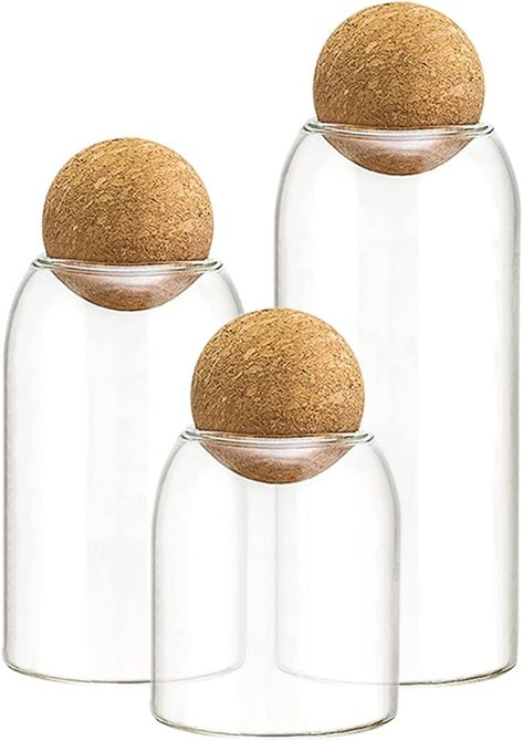 The spherical kitchen storage glass jar can be used to store all kinds of kitchen seasonings, whole grains, dry goods, etc., making your kitchen tidy and organized, and keeping food fresh for a long time. The kitchen glass storage jar includes 3 different sizes of glass jars, which can meet your needs for different sizes of glass jars, and items of different sizes can be stored in suitable size glass jars. Coffee Bean Jar, Cork Ball, Coffee Bar Station, Airtight Storage, Ball Storage, Glass Jars With Lids, Glass Storage Jars, Cork Lid, Glass Canisters