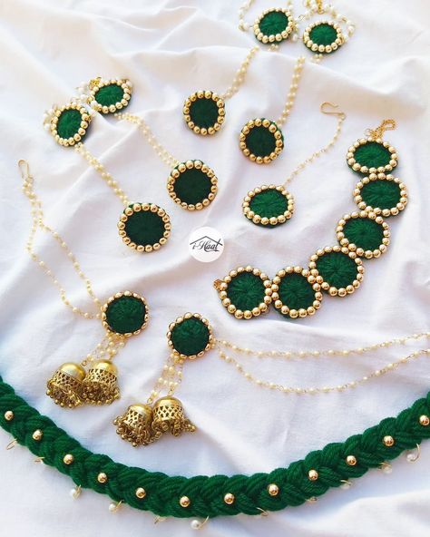 Items included: ❤️ Necklace ❤️ Jhumka with Sahara ❤️ Mang teeka ❤️ 2 Hathphool ❤️ 2 Ring Anklets ❤️ Waist belt Color customisation available 🔥 Are you someone who's planning her haldi/mehndi or baby shower ceremony? If yes checkout this beautiful green jewellery set adorned with lots of golden pearls to give it a simple, elegant and classy look for all your functions❤️ Visit indiashaat.com for more handmade bridal jewellery options #indiashaat #haldijewellery #mehndijewellery #b... Green Jewellery Set, Haldi Jewellery, Green Jewellery, Fabric Jewellery, Green Jewelry, Jewellery Set, Bridal Jewellery, Girly Jewelry, Simple Elegant