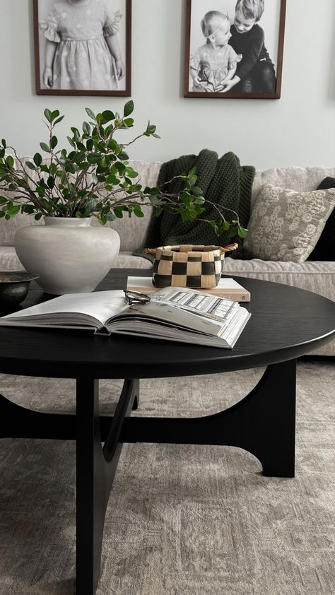 Black Coffee Table Circle, Black Coffee Table Living Room Decor, Black Rustic Coffee Table, Black Round Coffee Table Styling, Black Living Room Table Decor, Black Stained Coffee Table, Styling Black Coffee Table, Black Wood Coffee Table Living Room, Round Black Coffee Table Decor