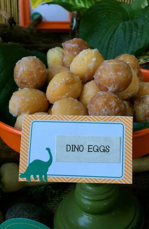 Donut dino eggs at a dinosaur birthday party!  See more party planning ideas at CatchMyParty.com! Dino Ranch Birthday Party Food, Dino Breakfast Party, Dino Party Drinks, Dino Drinks Dinosaur Birthday, Dinosaur Egg Scavenger Hunt, Dinosaur Theme Dessert Table, Diy Dinosaur Party Ideas, Dinosaur Deserts, Dino Ranch Birthday Party Cake