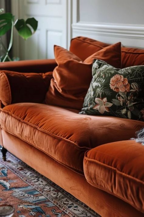 Rust Velvet Sofa: My Chic Living Room Update Velvet Sofa Cover Ideas, Rust Velvet Sofa Living Room, Mustard Velvet Sofa Living Room Ideas, Cinnamon Velvet Sofa, Living Room With Burnt Orange Couch, Colorful Sofas Ideas Living Room, Rust Velvet Couch, Patterned Couch Living Room, Rust Couch Living Room