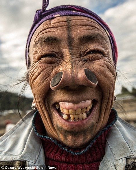 Indian tribe where the woman must have ‘nose plugs’ fitted | Daily Mail Online Orr Piercing, Tribes Of The World, Old Faces, Indian Tribes, Amazing Pics, Old Woman, Many Faces, Old People, People Of The World