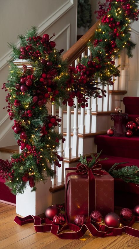 Discover elegant burgundy Christmas decor ideas that bring warmth and sophistication to your home this holiday season. White And Red Christmas Decorations, Traditional Christmas Garland Ideas, Silver Gold And Red Christmas Decor, Dream Christmas Decor, Holiday Bow Decor, Christmas Decorations Luxury, Red Gold And White Christmas Decor, Christmas Trees With Red Decorations, Elegant Christmas Porch Decor