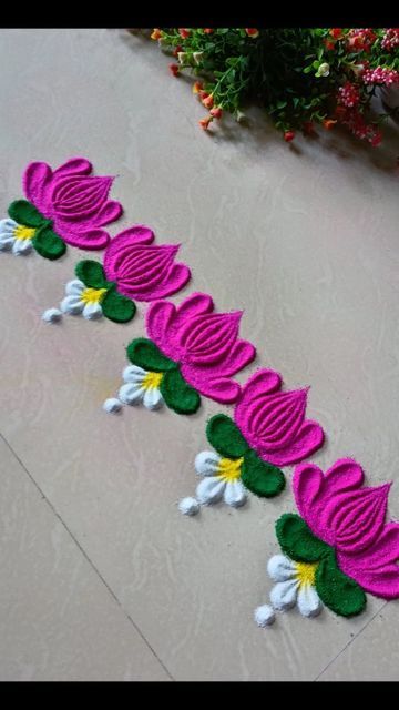 Rangoli Minimal, Bela Rangoli Design, Rangoli With Lotus Design, Rangoli On Steps, Rangoli Near Door, One Line Rangoli Designs, Border Flower Rangoli, Beautiful And Easy Rangoli Designs, Rangoli Circle Designs