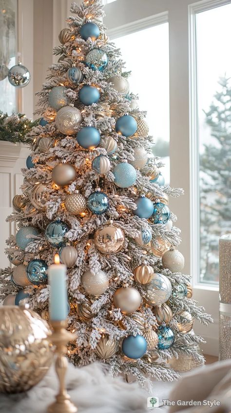 100 White Christmas Tree Ideas Trending in 2024 - The Garden Style Blue Christmas Tree With White Ornaments, White Christmas Tree Blue Ornaments, Christmas Tree Ideas For Green Tree, Blue Gold White Christmas Decor, Aqua And Gold Christmas Tree, Happy New Year Tree Ideas, Christmas Tree Ideas Light Blue, Christmas Tree Lighting Ideas, Christmas Tree Ideas Colors