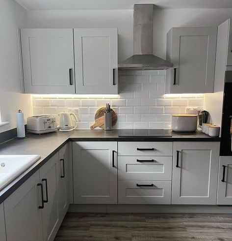 Love our kitchen choices 🤍 . . . #newbuid #kitchendesign #kitchendecor #symphonykitchen #shakerkitchen | Instagram Kitchen Presses Colours, Light Grey Kitchen Black Worktop, Dark Worktop Kitchen Ideas, Kitchen Colour Schemes Black Worktop, Grey On Grey Kitchen, Kitchen Ideas Grey Countertops, New Build Kitchen Ideas Design, White Kitchen Grey Worktop, Grey Kitchen Black Worktop